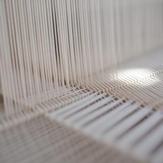 Handloom detail with shuttle