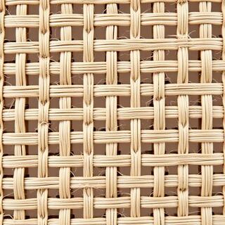 Handloom with cane shuttle mid-weave