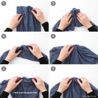 Folding a scarf along its seam memory