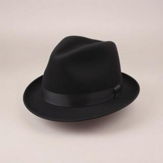 Black wool fedora — matte felt texture close-up